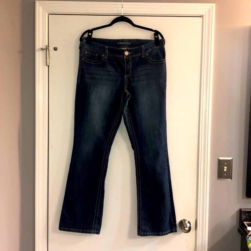 Denim Jeans with boot cut legs.